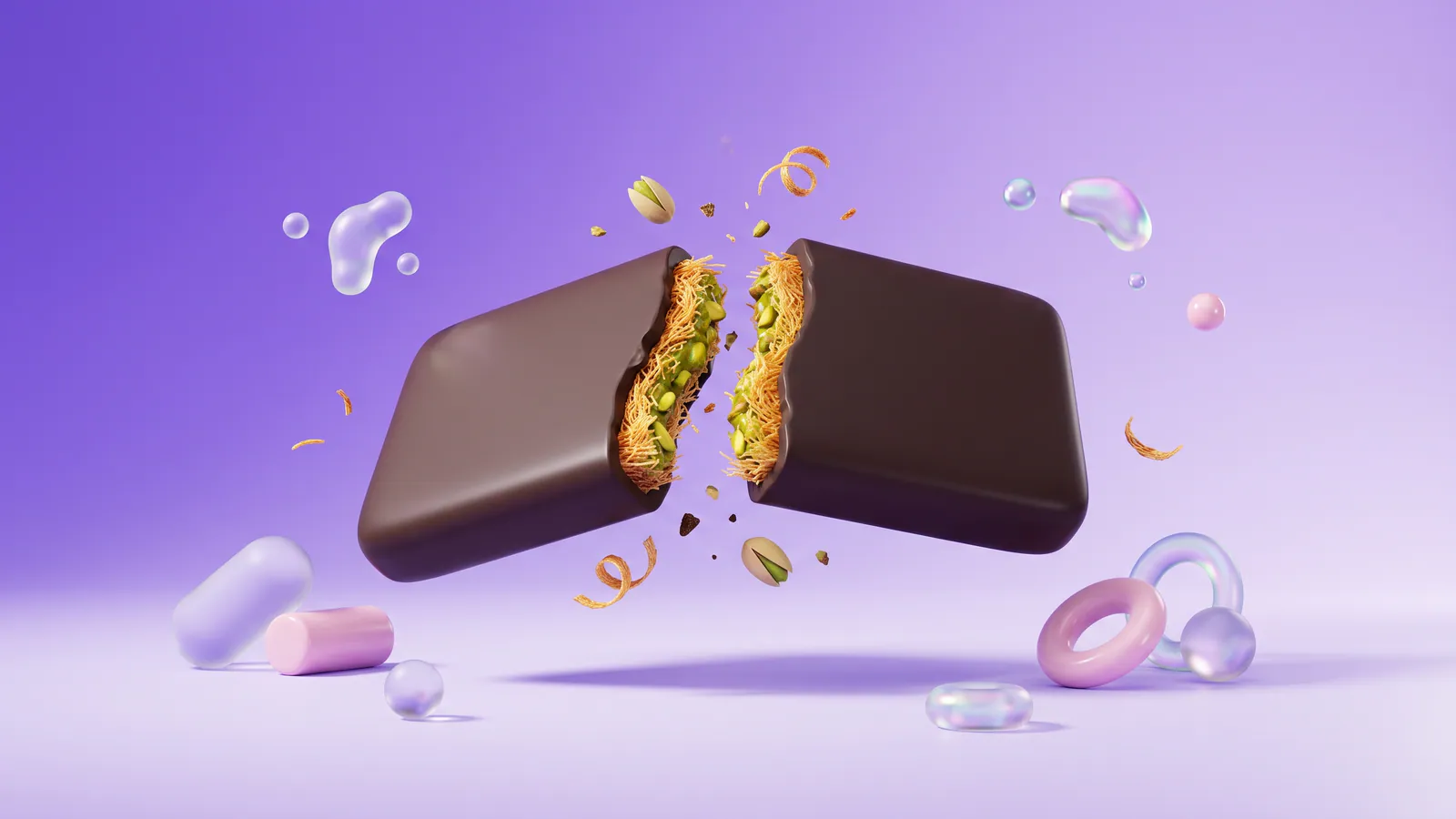 A chocolate bar broken in half showing a green pistachio and golden pastry filling, with pistachios floating nearby.